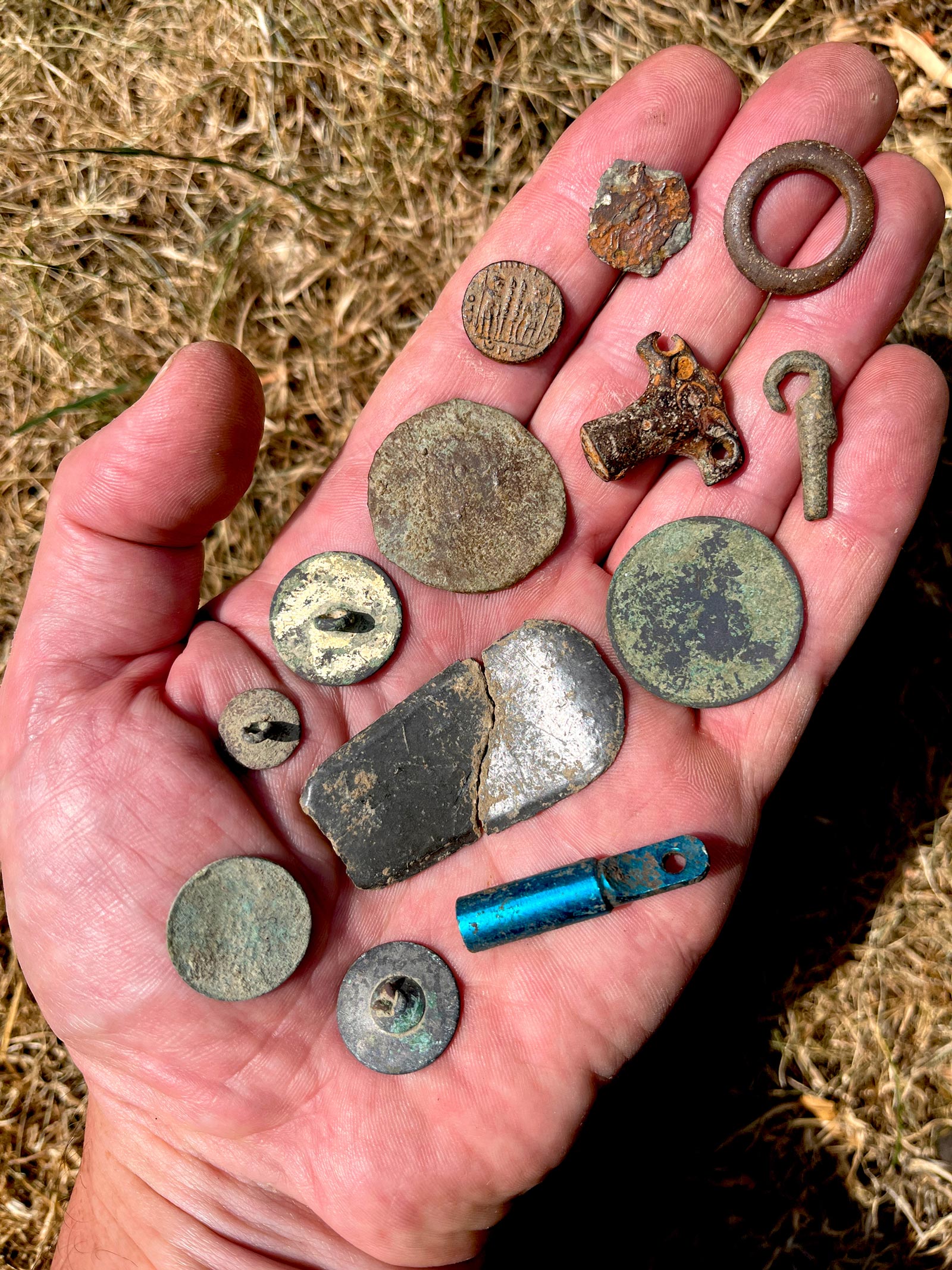 Hand with Constantine coin
